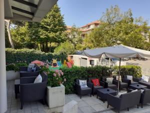 A patio or other outdoor area at Residence Aries