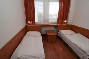 Postel nebo postele na pokoji v ubytování Hotel Avion