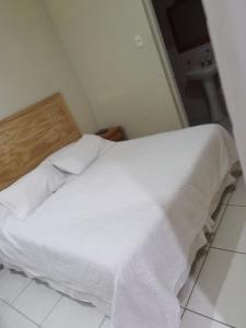 Кровать или кровати в номере Hotel Palermo Quintero
