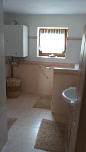 Koupelna v ubytování Apartmány u Pilaře + 3 fotografie