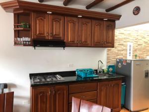 Kuchyň nebo kuchyňský kout v ubytování CABAÑA VILLA OMI