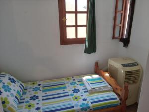 Llit o llits en una habitació de Fantastic House with a Wonderful View of the Sea