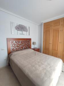 Posteľ alebo postele v izbe v ubytovaní Apartment next to the beach
