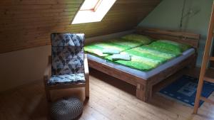 Postel nebo postele na pokoji v ubytování Apartmány u Pilaře