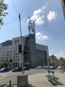 a building with a crane on top of it at Mon Paris in Paris