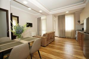 Et tv og/eller underholdning på Borjomi-Likani Premium Apartments