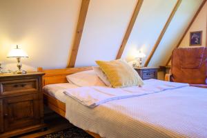 Postel nebo postele na pokoji v ubytování Apartament "CISÓWKA"
