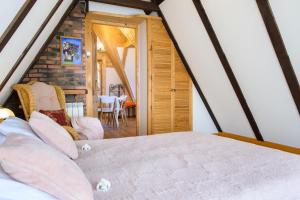 Postel nebo postele na pokoji v ubytování Apartament "CISÓWKA"