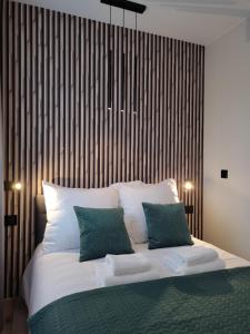 Posteľ alebo postele v izbe v ubytovaní Apartament Zamkowe Wzgórze