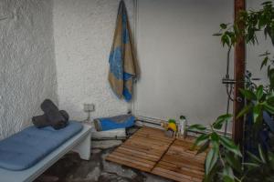 a room with a bed and an umbrella at Sea Frame in Skiathos Town