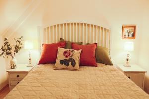 Postel nebo postele na pokoji v ubytování Babér Cottage Vendégház Tihany