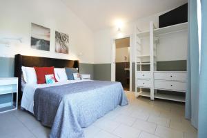 Postel nebo postele na pokoji v ubytování Villa Elprado