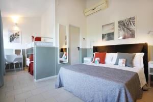 Postel nebo postele na pokoji v ubytování Villa Elprado