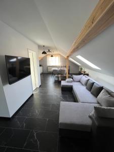 TV a/nebo společenská místnost v ubytování Die Loft