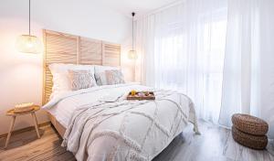 Posteľ alebo postele v izbe v ubytovaní Apartament No 6 - HOME APART