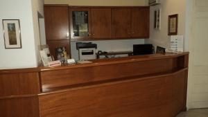 A cozinha ou cozinha compacta de Savoy City Hotel