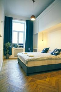 Ένα ή περισσότερα κρεβάτια σε δωμάτιο στο 4th Floor Bed and Breakfast