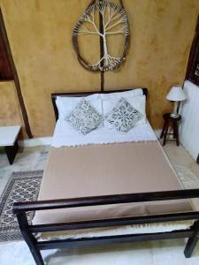 Katil atau katil-katil dalam bilik di Casa da Floresta entre Paraty e Ubatuba