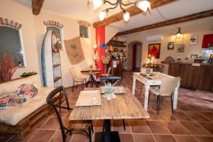 a living room with a couch and a table at B&B Naturin - Vegan Eco Farm in Lauriano