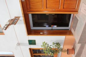 Un televizor și/sau centru de divertisment la Picol Hostal