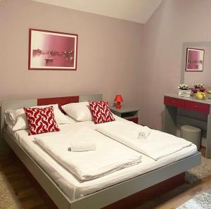 Ένα ή περισσότερα κρεβάτια σε δωμάτιο στο Guest House Aleksandra