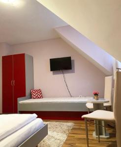 TV a/nebo společenská místnost v ubytování Guest House Aleksandra