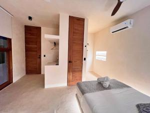 Postel nebo postele na pokoji v ubytování Tikul Hotel Boutique