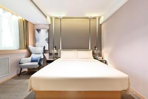Ένα ή περισσότερα κρεβάτια σε δωμάτιο στο Atour Hotel Beijing Liuli Bridge West Station +58 φωτογραφίες