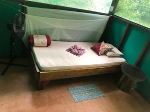 Una cama o camas en una habitación de Mohagine Hotel