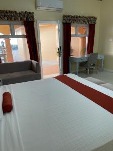 Lova arba lovos apgyvendinimo įstaigoje Hotel Grand A View