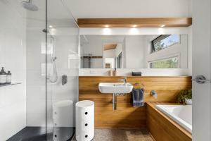 a bathroom with a sink and a shower at Aalborg Bright in Bright