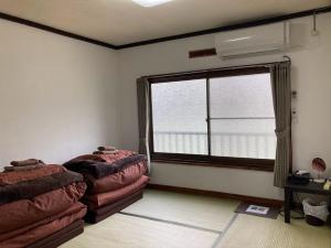 Photo de la galerie de l'établissement ゲストハウス尾道ポポー Guesthouse Onomichi Pawpaw, à Onomichi