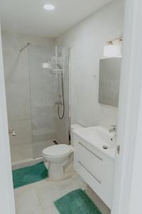 Um banheiro em Beachfront Bella Horizonte 2
