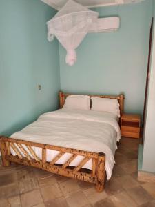 מיטה או מיטות בחדר ב-Bucolic Heritage Resort