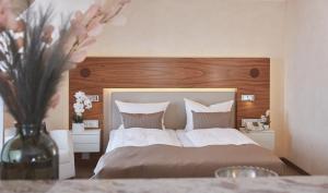 Postel nebo postele na pokoji v ubytování Klüt Hotel + 37 fotografií