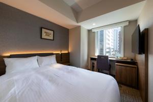 Postel nebo postele na pokoji v ubytování Hotel Rilassare Tokyo + 33 fotografií