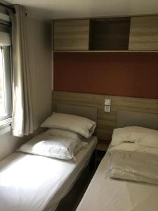 Postel nebo postele na pokoji v ubytování La Baume 515