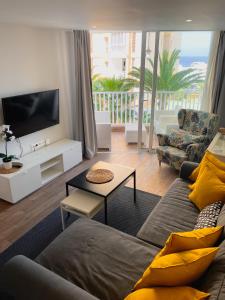 TV a/nebo společenská místnost v ubytování Harmony Apartments