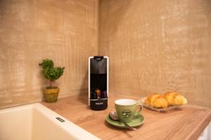 Coffee and tea making facilities at Blue Ark Comfort near Acropolis