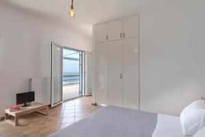 Posteľ alebo postele v izbe v ubytovaní Lotos House - Unique Seaview Apartment