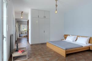 Posteľ alebo postele v izbe v ubytovaní Lotos House - Unique Seaview Apartment