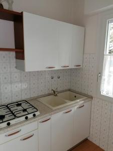 Küche/Küchenzeile in der Unterkunft Condominio Rosa