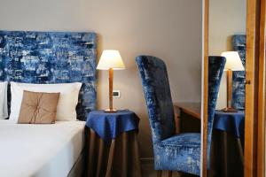 Voodi või voodid majutusasutuse BeYou Hotel Ponte Milvio toas