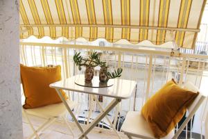 A seating area at Casa Vacanze Terramare, 550 mt from the beach, close to Ortigia historic center