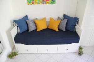 A bed or beds in a room at Casa Vacanze Terramare, 550 mt from the beach, close to Ortigia historic center