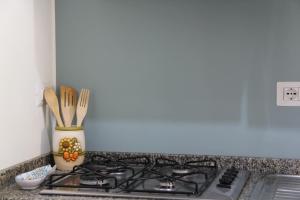 A kitchen or kitchenette at Casa Vacanze Terramare, 550 mt from the beach, close to Ortigia historic center