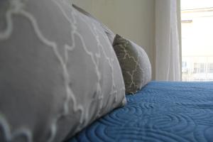 A bed or beds in a room at Casa Vacanze Terramare, 550 mt from the beach, close to Ortigia historic center