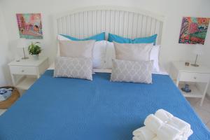 A bed or beds in a room at Casa Vacanze Terramare, 550 mt from the beach, close to Ortigia historic center