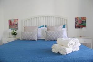 A bed or beds in a room at Casa Vacanze Terramare, 550 mt from the beach, close to Ortigia historic center
