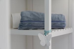 A bed or beds in a room at Casa Vacanze Terramare, 550 mt from the beach, close to Ortigia historic center